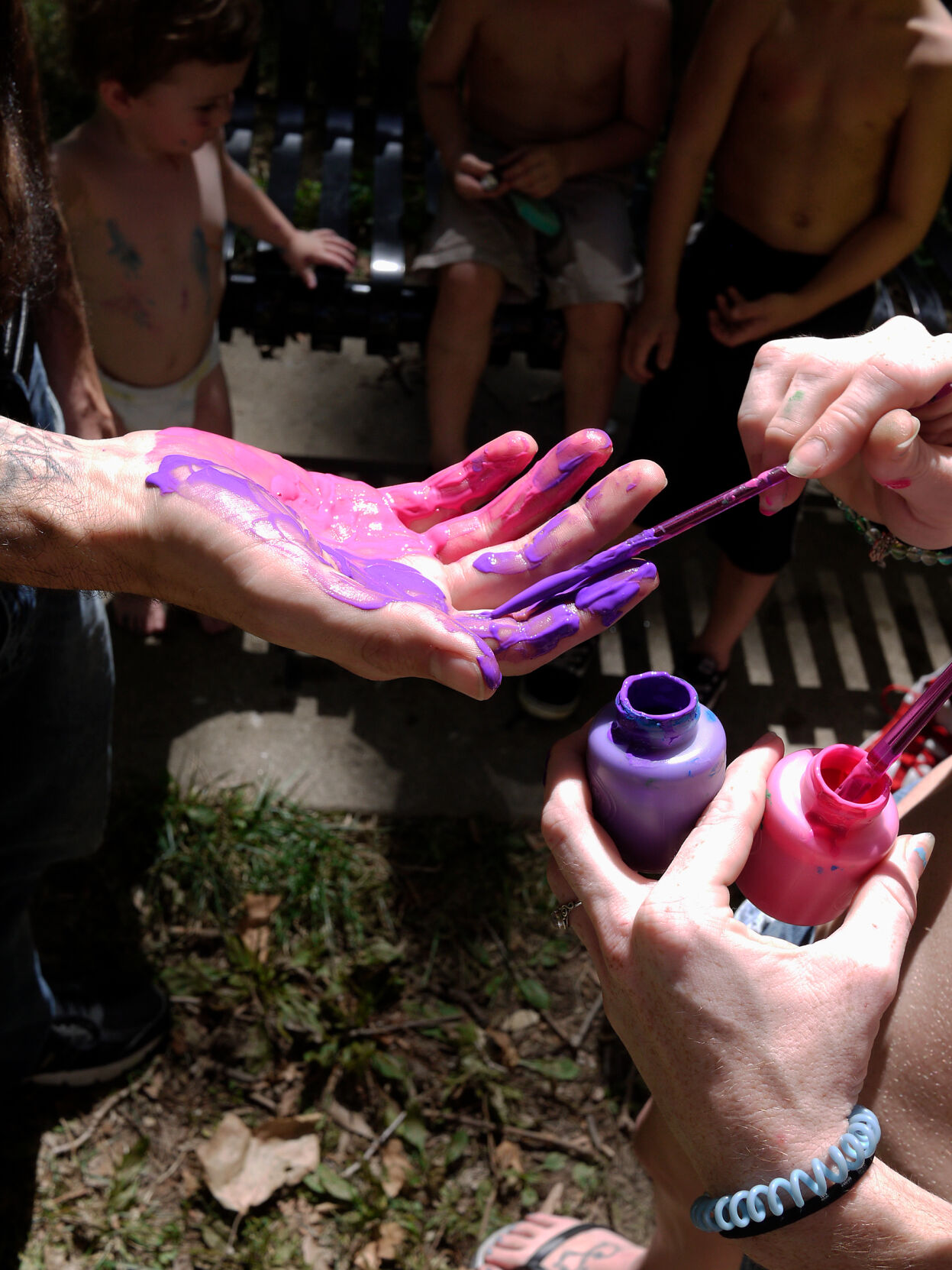 Tabia Jones paints her partner Shawn Tuder’s